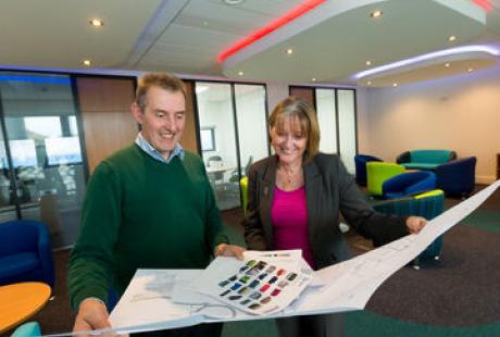 Roger Hallett and Freya Cross in the lounge which BSB Architecture designed at The Deep Business Centre