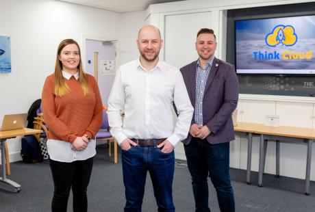 3 people stood in an office of Think Cloud