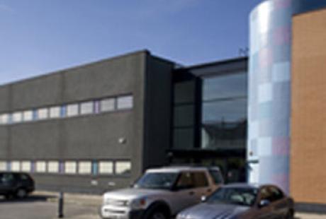 Cars parked in front of the Business Centre