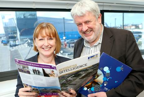 Freya Cross with Phil Ascough holding leaflets